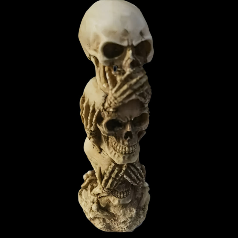 Skulls of the Unspoken Law Statue
