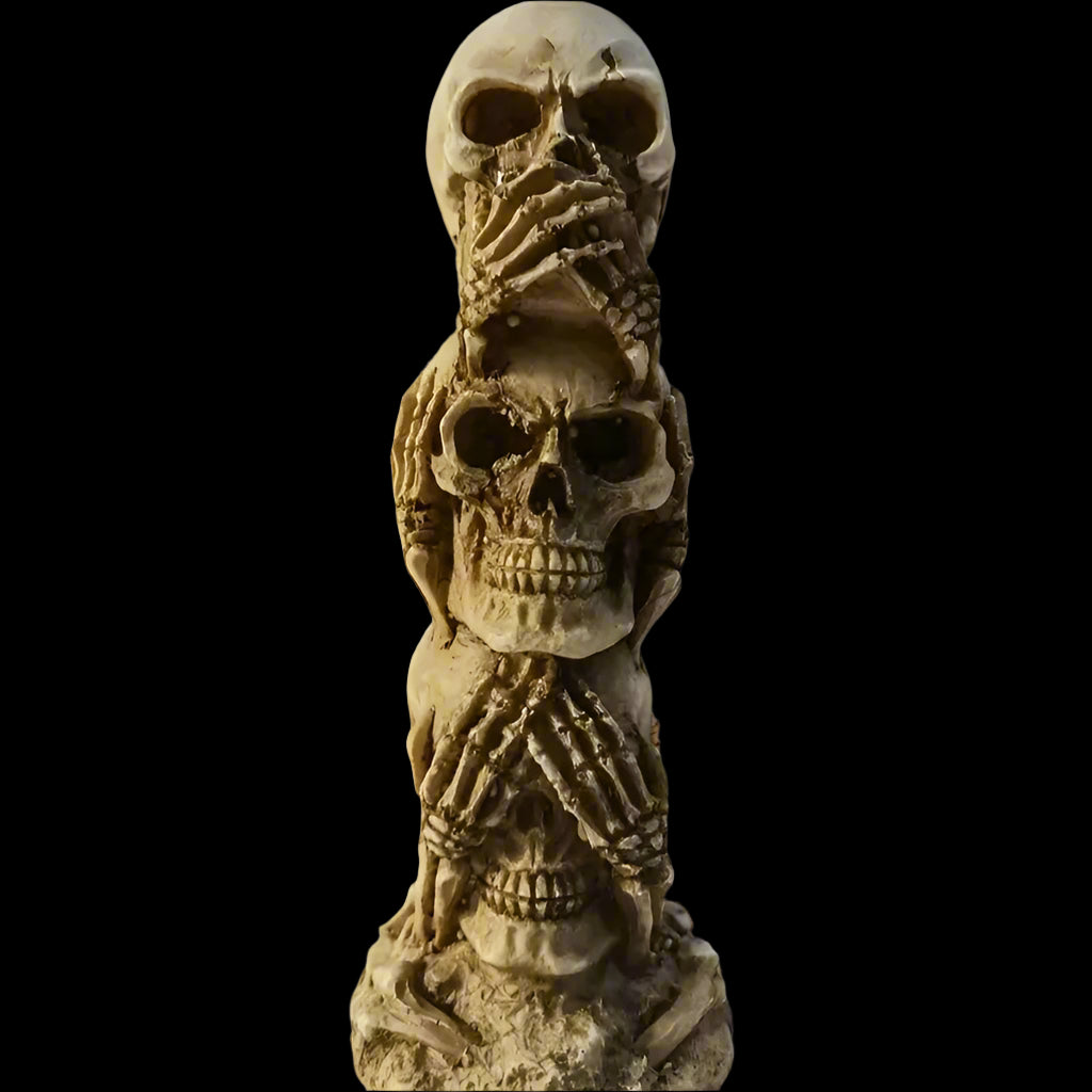 Skulls of the Unspoken Law Statue