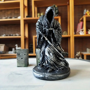 The Shadow of the Black Mast Statue