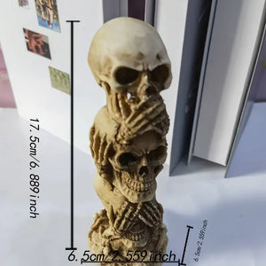 Skulls of the Unspoken Law Statue
