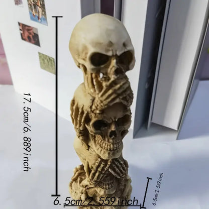 Skulls of the Unspoken Law Statue